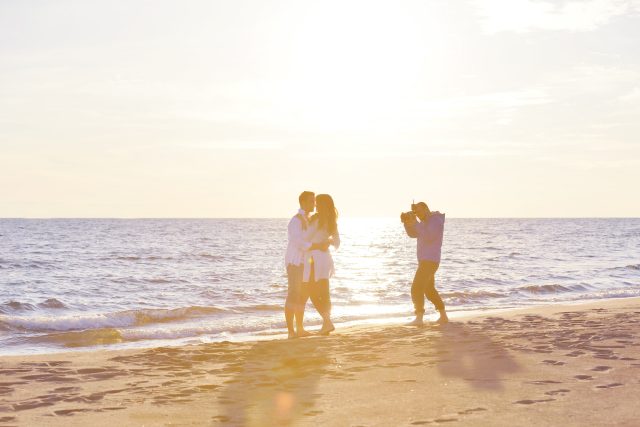 mp9682213-photographer-taking-photo-on-beach.jpg
