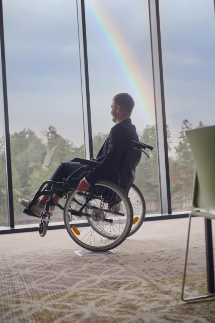 mp62097740-successful-businessman-with-a-disability-enjoys-a.jpg